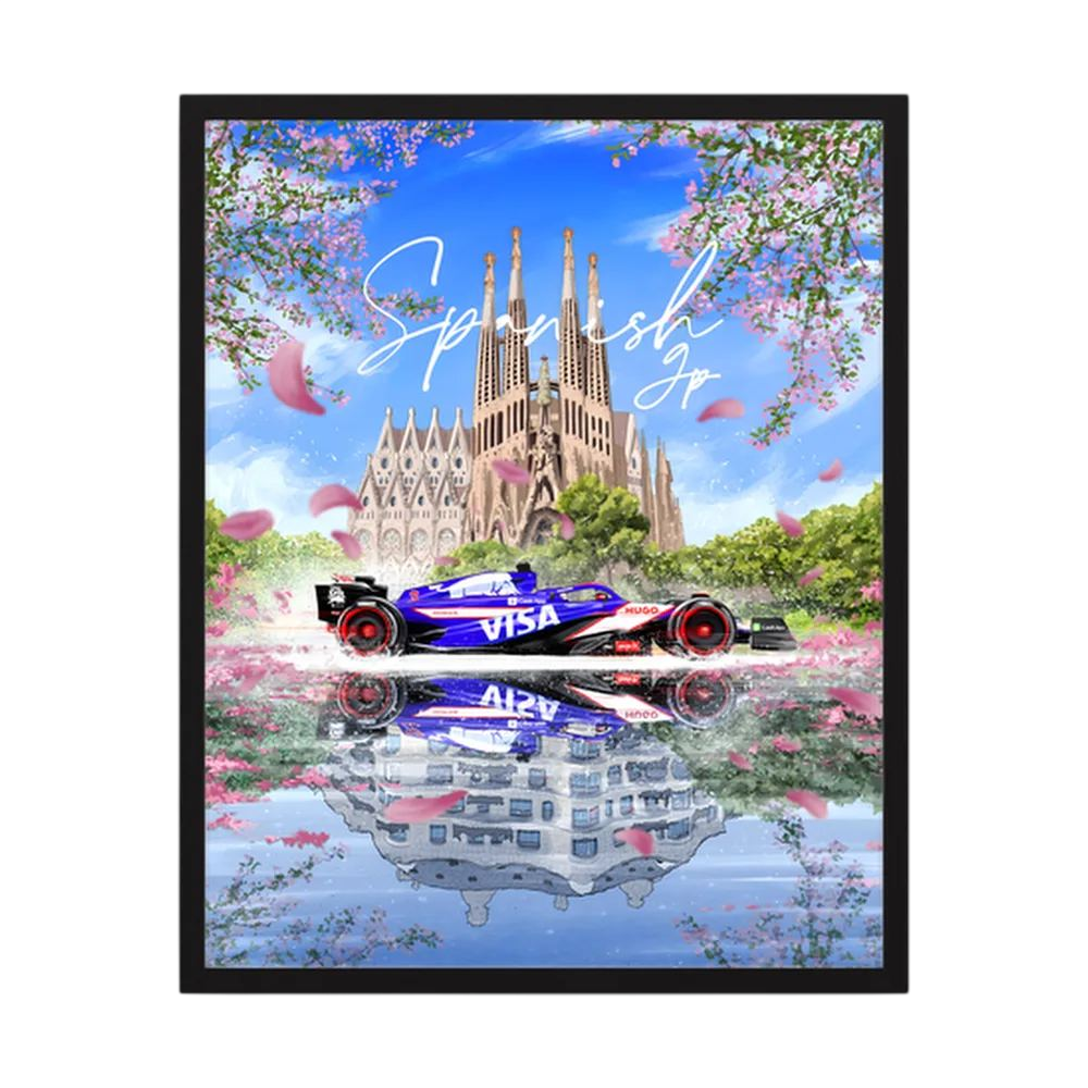 Formula One car before Barcelona's Sagrada Família with pink blossom and mirrored water.