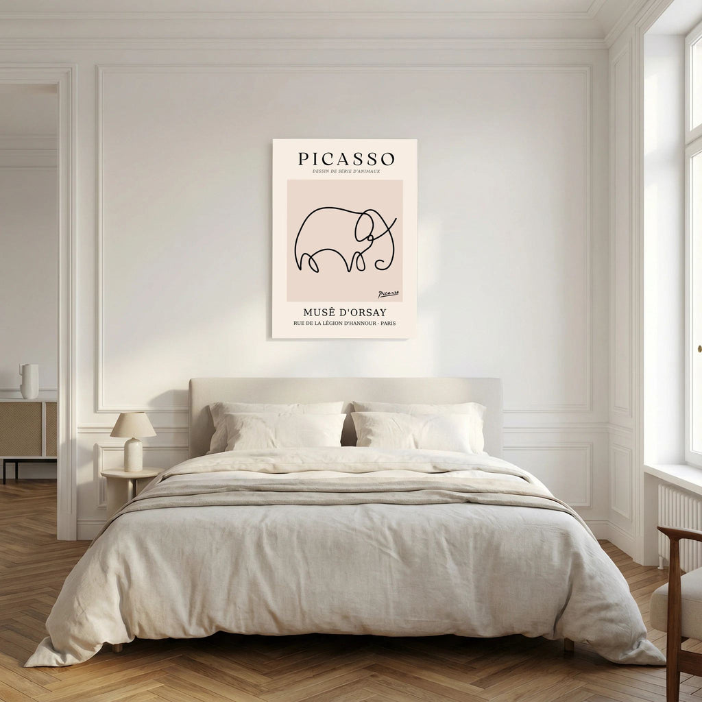 Single flowing black line forms an elephant on a warm beige museum-style poster, shown in product view 5.