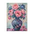 Pink and blue peonies in an ornate blue vase.