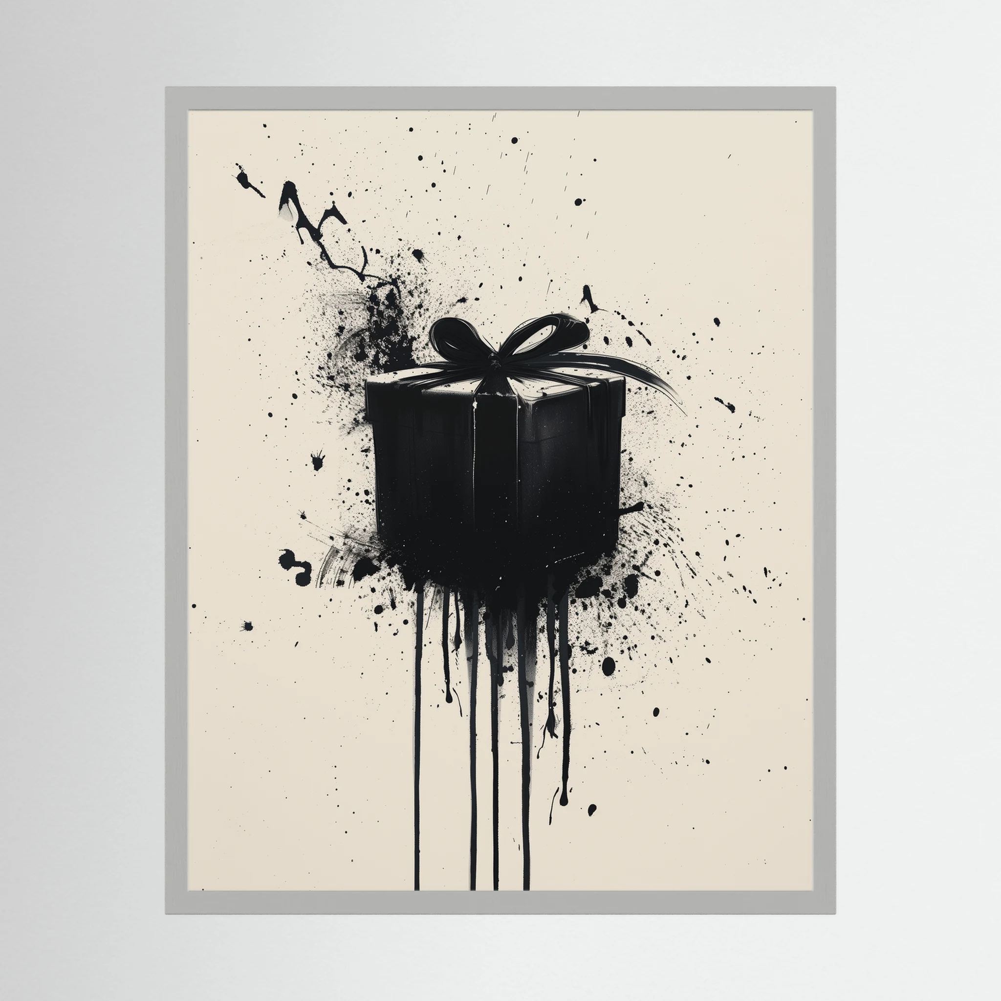 Black gift box with ribbon surrounded by expressive paint splashes on a cream background, shown in product view 2.
