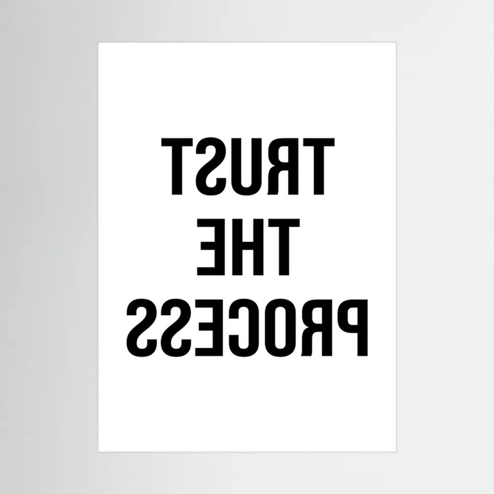 Black mirrored typography spells trust the process backwards against a clean white background, shown in product view 3.
