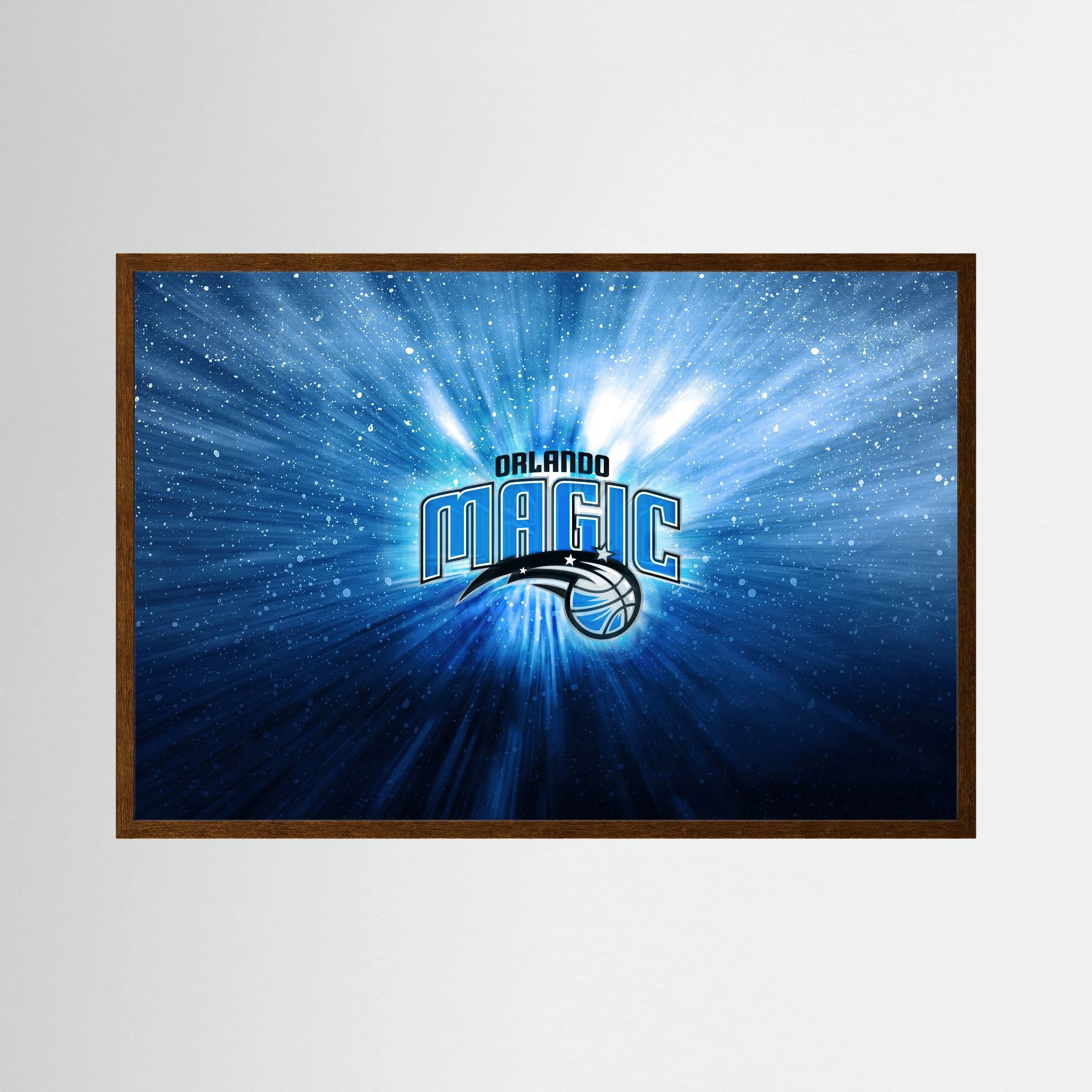 Orlando Magic basketball logo glows amid blue radial light and sparkling white particles, shown in product view 3.