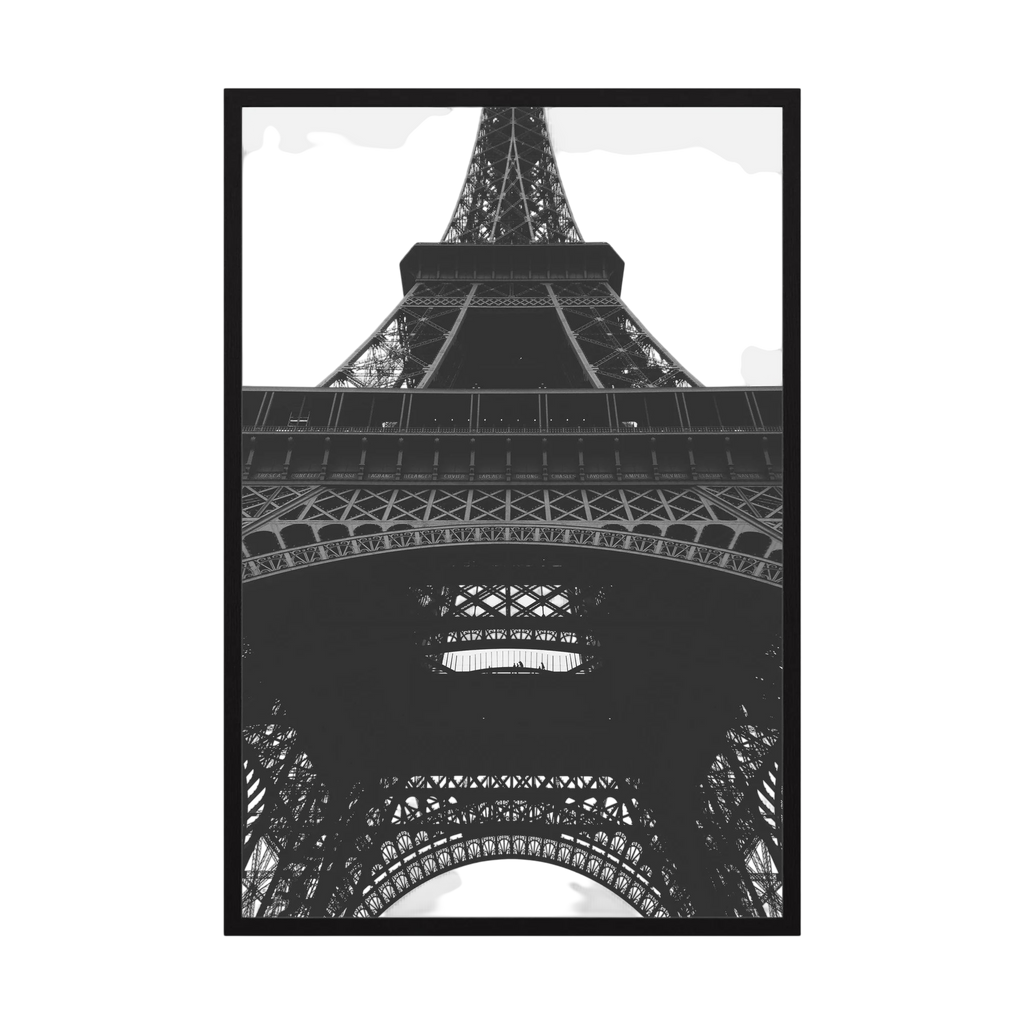 Black and white view looking upward through the iron structure of the Eiffel Tower.