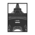 Black and white view looking upward through the iron structure of the Eiffel Tower.
