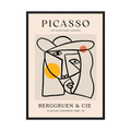 Cubist face drawn in strong black lines with yellow and orange circles on a neutral exhibition-style poster, shown in product view 3.