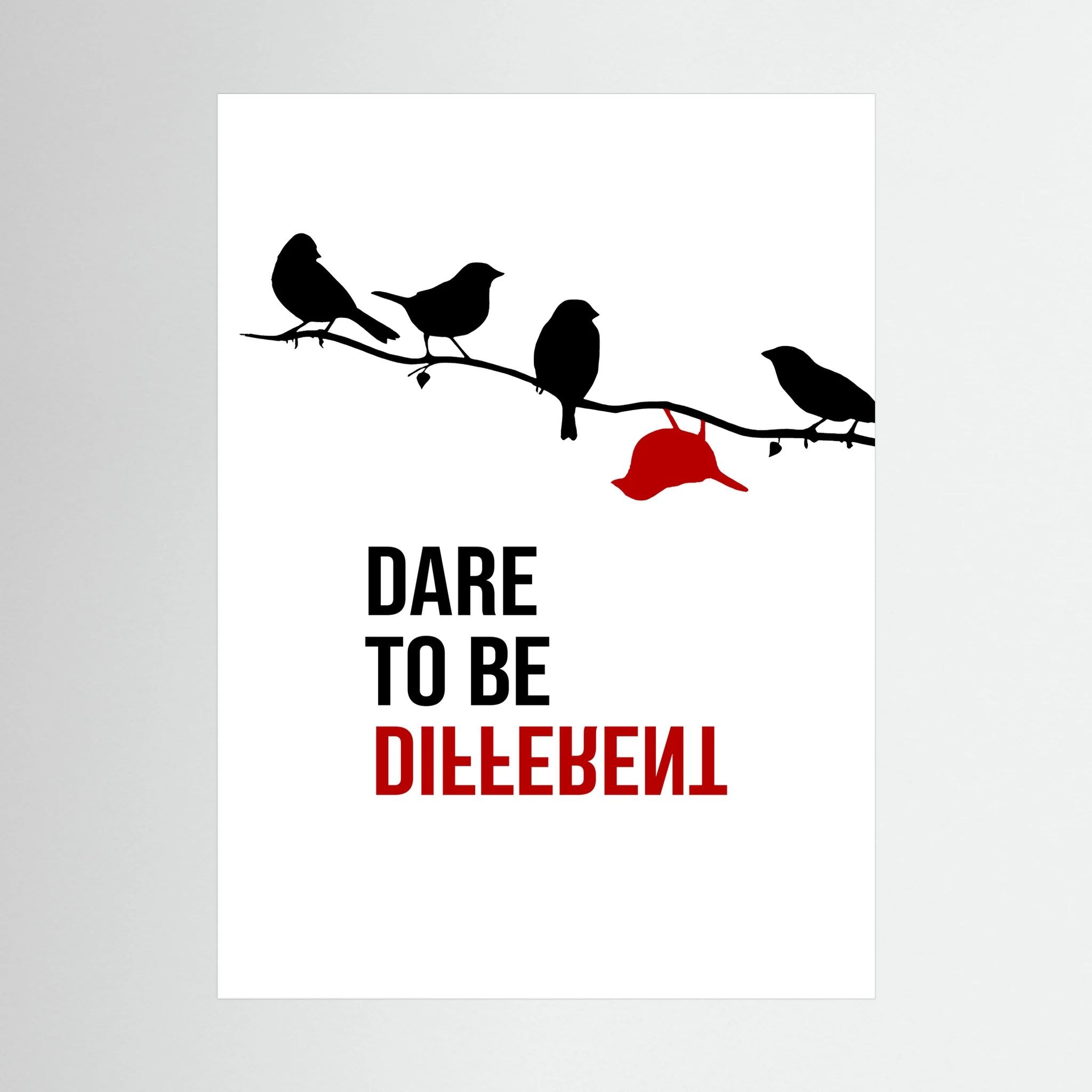 Black birds sit on a branch above dare to be different typography, with one red bird hanging apart.