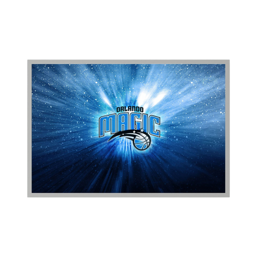 Orlando Magic basketball logo glows amid blue radial light and sparkling white particles.